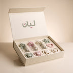 Le Coffret Complet LIYAN ouvert : trois biberons, trois tétines et trois anneaux de dentition